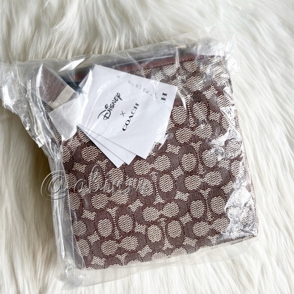 Bundle of Coach Jacquard Disney Wristlet and Kitt Messenger Crossbody - Picture 3 of 4